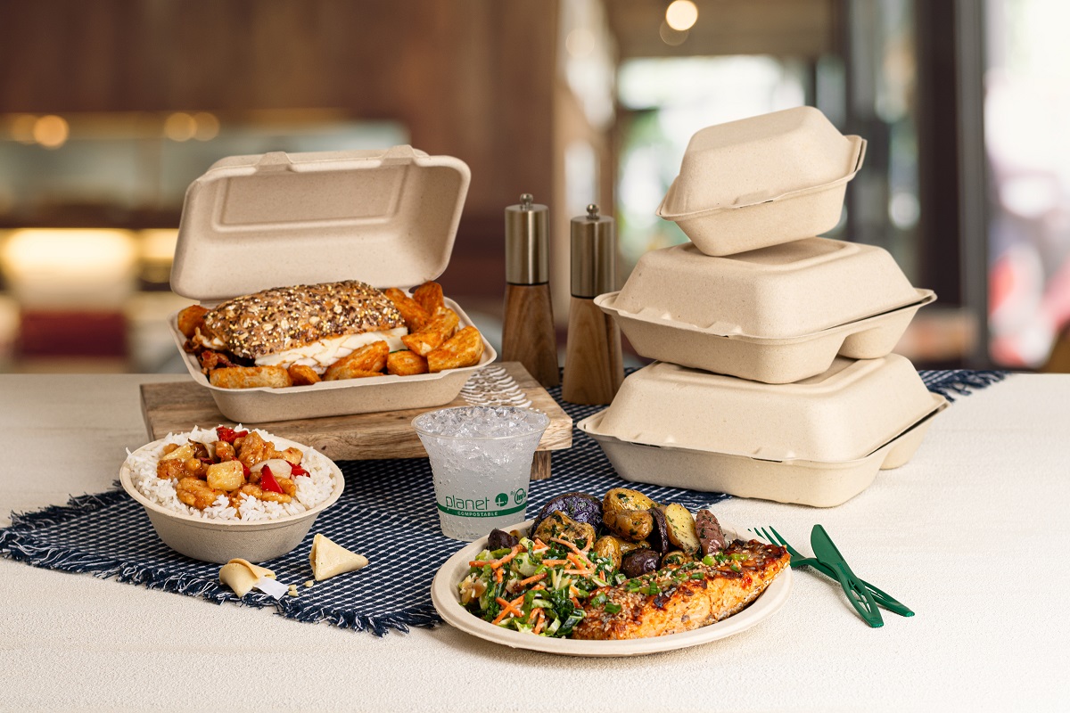 Compostable foodservice sample kit with kraft cups, bagasse plates, wooden cutlery and paper straws on a linen backdrop